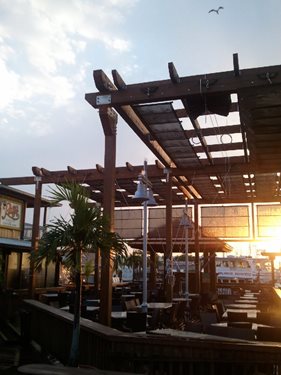 Rusty's seafood and oyster bar deck shade