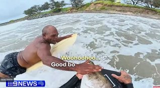 Surfer lands a Barramundi barehanded